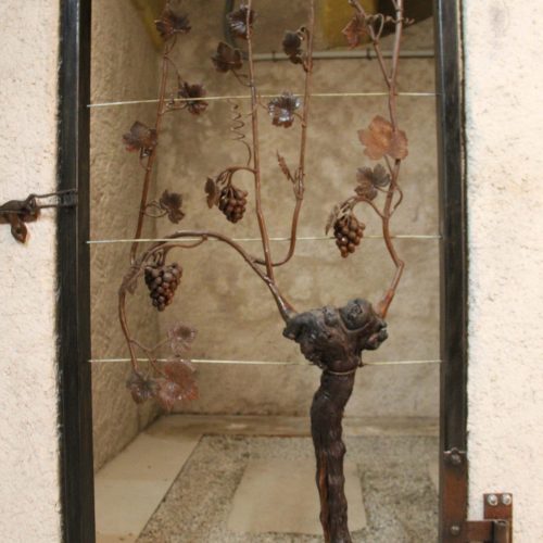 Porte avec bois de vigne